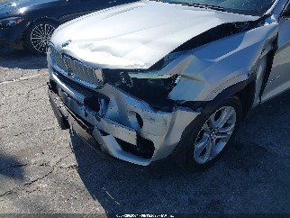 2015 Bmw X4, VIN 5UXXW3C56F0M87217. Фото 6 из 6 с аукциона IAAI. Каталог авто из США OpenDataCar.