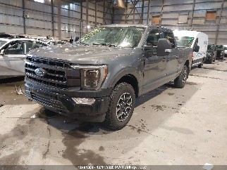 2023 Ford F-150 Lightning, VIN 1FTFW1E83PKF39952. Фото 2 з 6 з аукціону IAAI. Каталог авто зі США OpenDataCar.