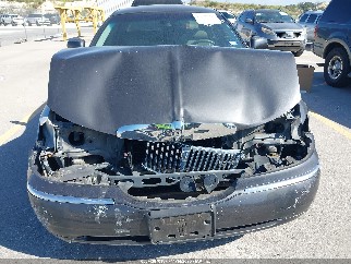 1999 Lincoln Town Car, VIN 1LNHM82W1XY662927. Фото 6 з 6 з аукціону IAAI. Каталог авто зі США OpenDataCar.