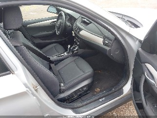 2014 Bmw X1, VIN WBAVM1C5XEVW53014. Photo 5 of 6 from IAAI auction. OpenDataCar US salvage catalog.