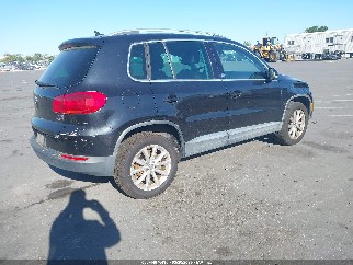 2017 Volkswagen Tiguan, VIN WVGSV7AX9HW512486. Zdjęcie 4 z 6 z aukcji IAAI. Katalog aut z USA OpenDataCar.