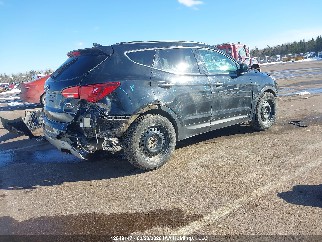 2018 Hyundai Santa Fe, VIN 5NMZUDLB0JH074309. Zdjęcie 4 z 6 z aukcji IAAI. Katalog aut z USA OpenDataCar.