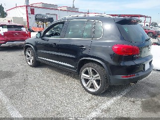 2014 Volkswagen Tiguan, VIN WVGBV3AX9EW081118. Фото 3 из 6 с аукциона IAAI. Каталог авто из США OpenDataCar.