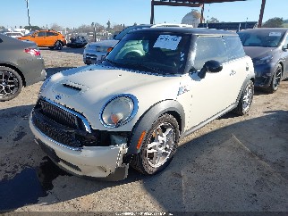 2007 Mini Cooper, VIN WMWMF73507TL88837. Фото 2 з 6 з аукціону IAAI. Каталог авто зі США OpenDataCar.