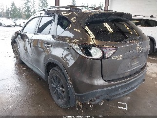 2016 Mazda CX-5, VIN JM3KE4CY1G0876399. Фото 3 з 6 з аукціону IAAI. Каталог авто зі США OpenDataCar.