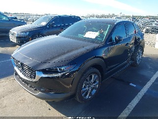 2024 Mazda CX-30, VIN 3MVDMBDM2RM671628. Фото 2 из 6 с аукциона IAAI. Каталог авто из США OpenDataCar.